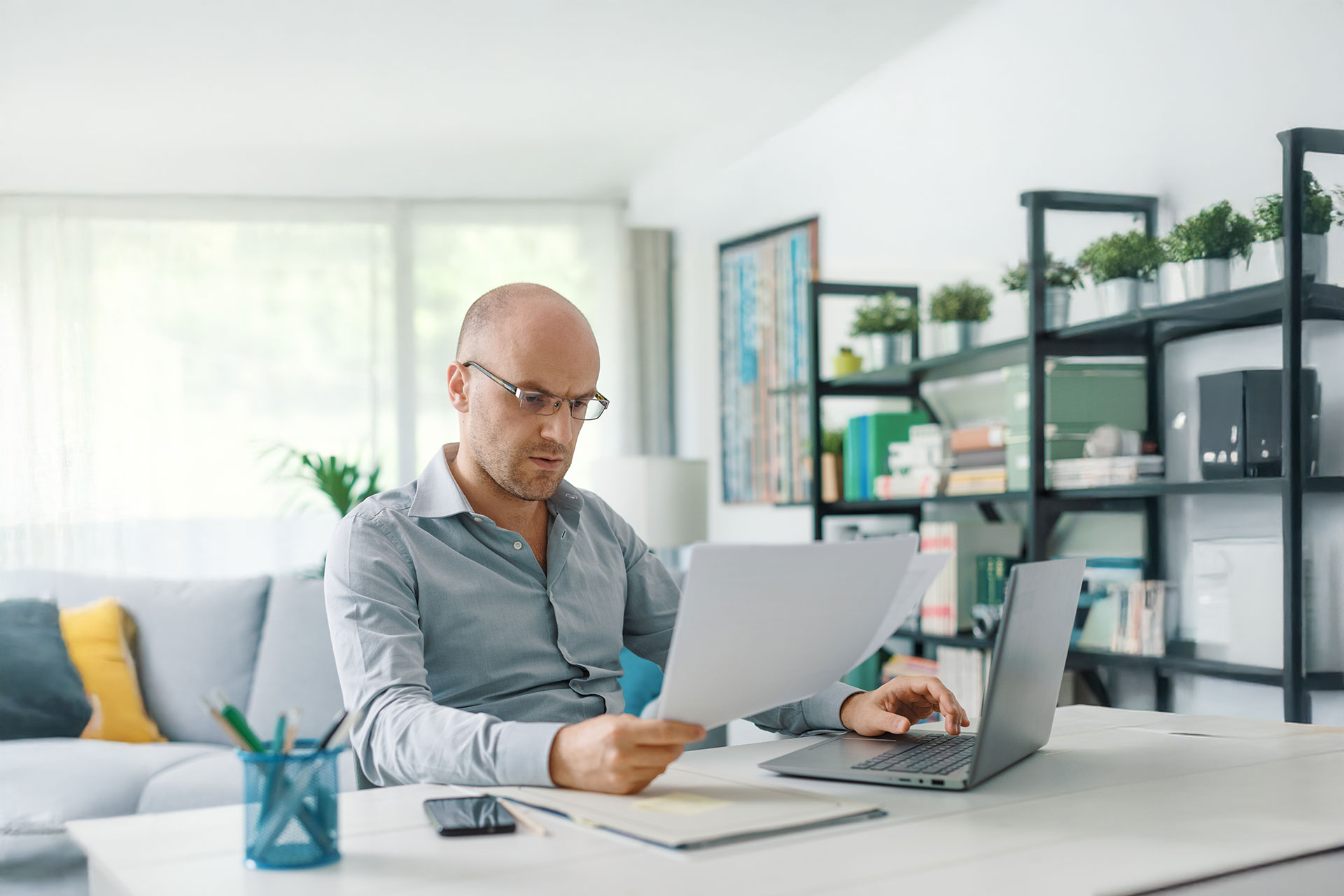 Man looking at report